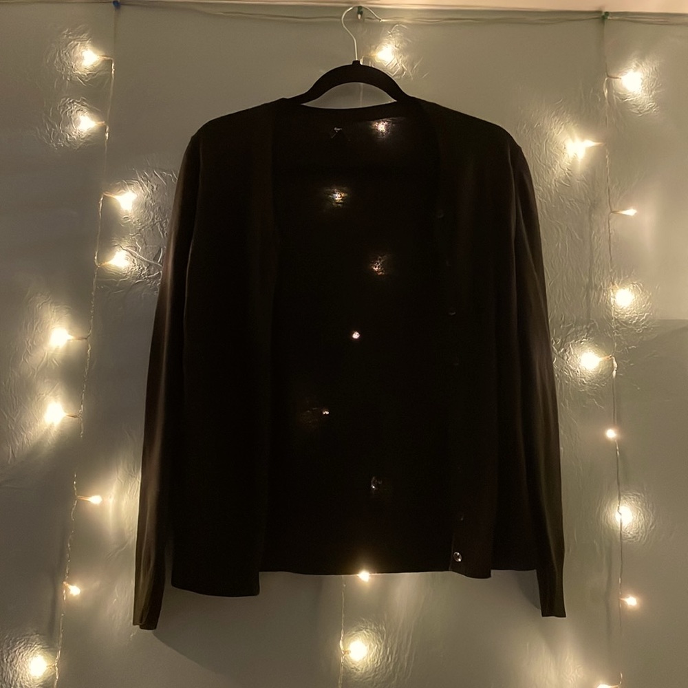 A black button up sweater